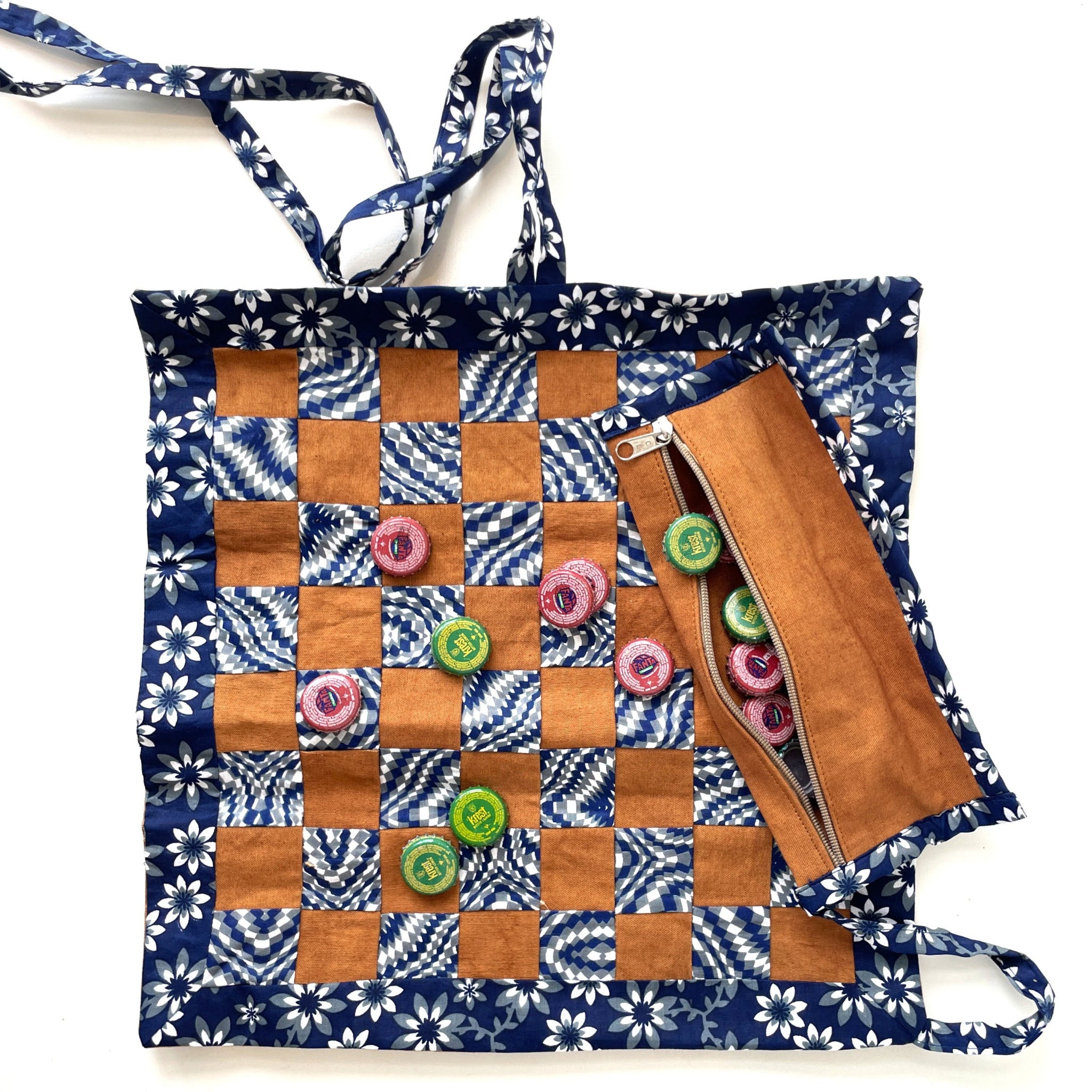 Checkered bag with wooden pieces on a white background