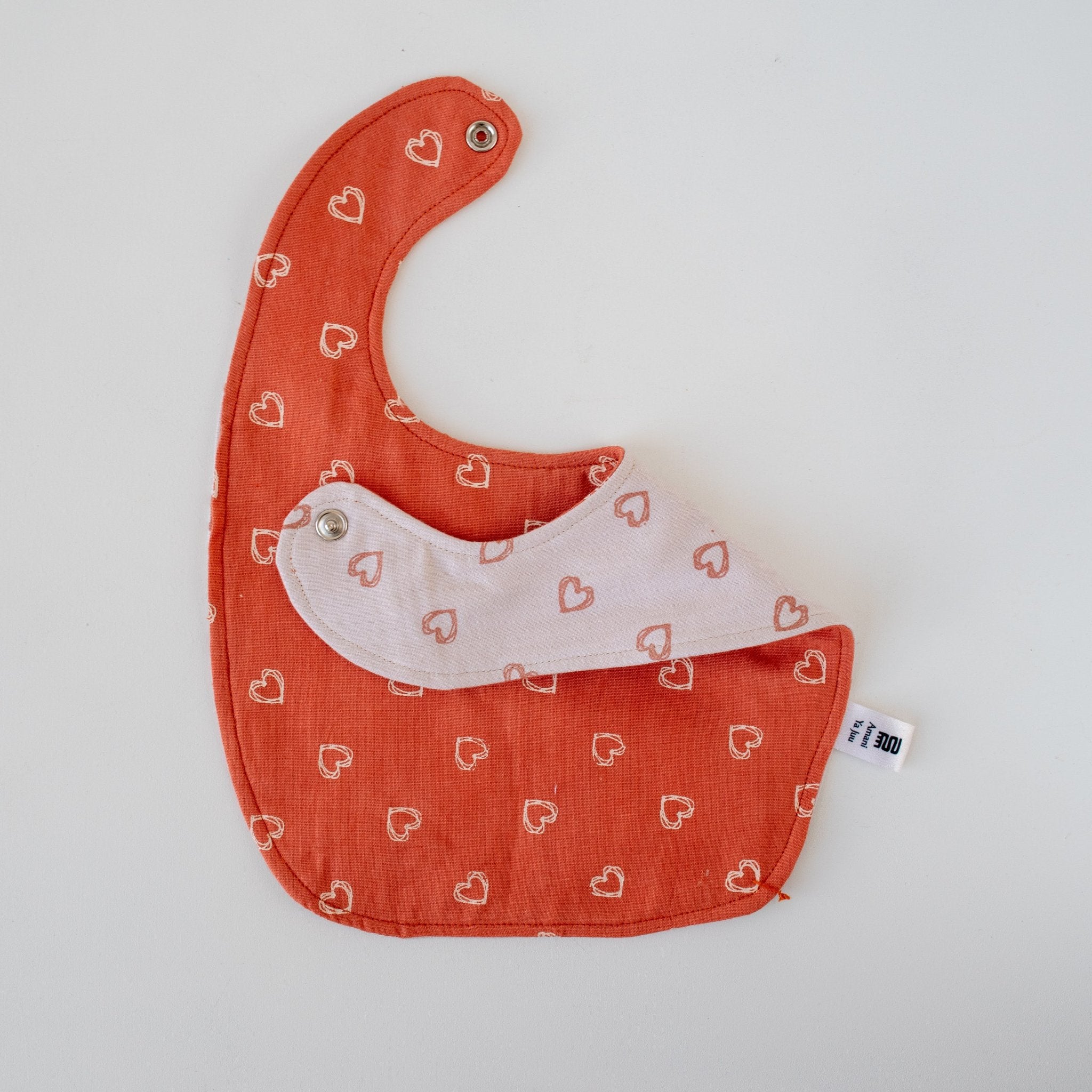 Watoto Baby Bib - Kenyan materials and design for a fair trade boutique