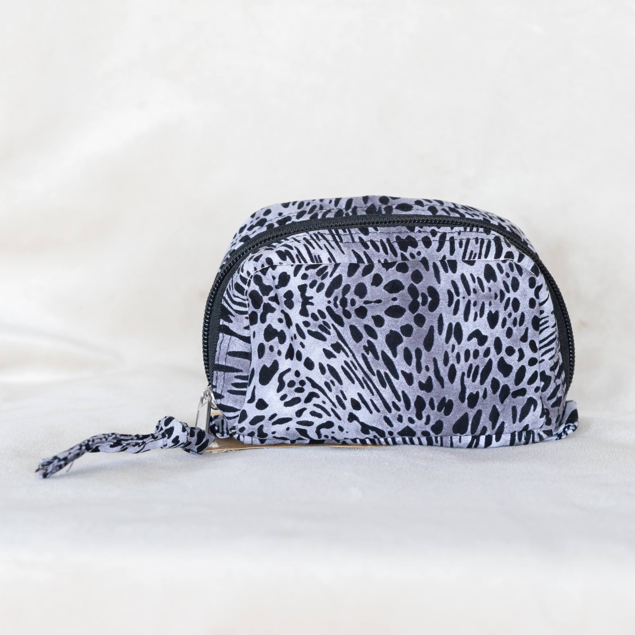 Grey and Black mini travel case on white background
