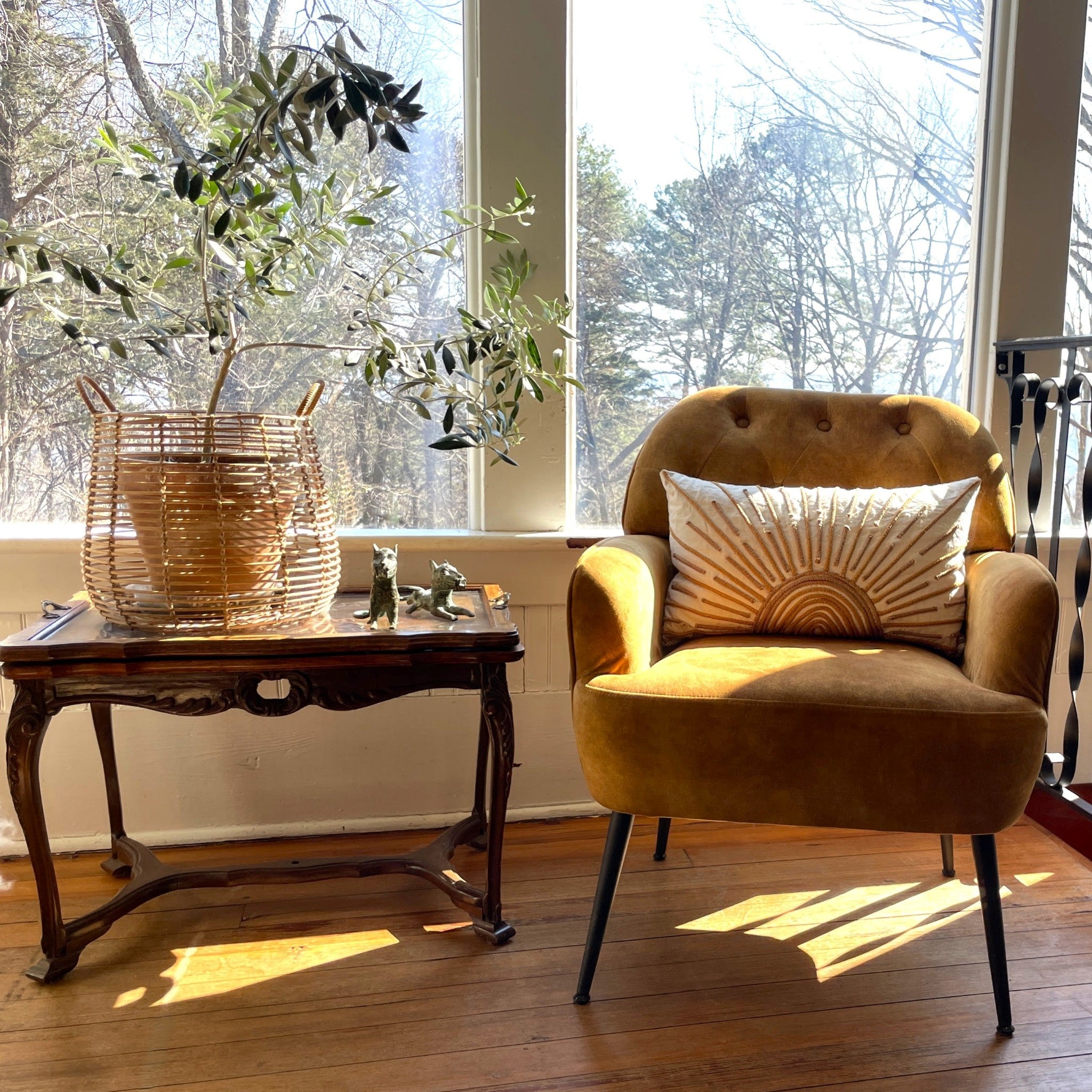 Sunburst pillow on armchair