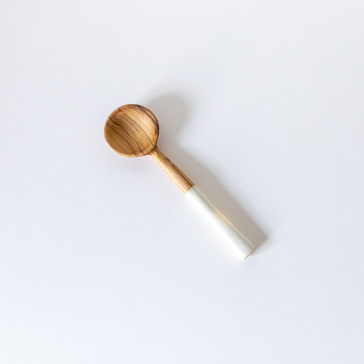 Petite wooden spoon with white bone handle