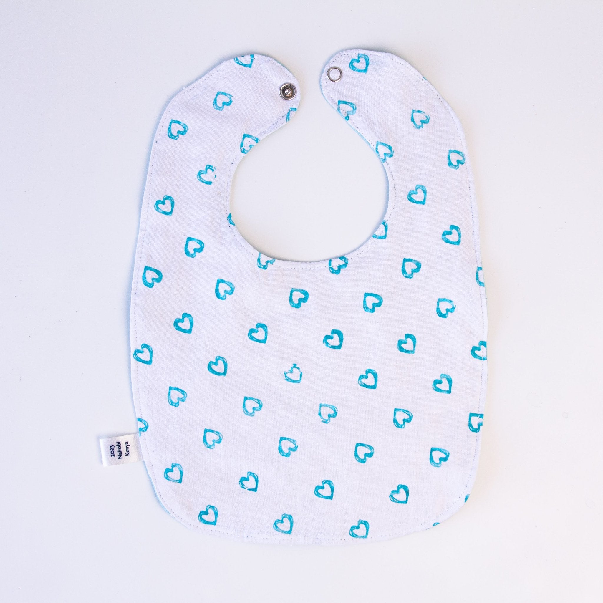 Watoto Baby Bib - Kenyan materials and design for a fair trade boutique