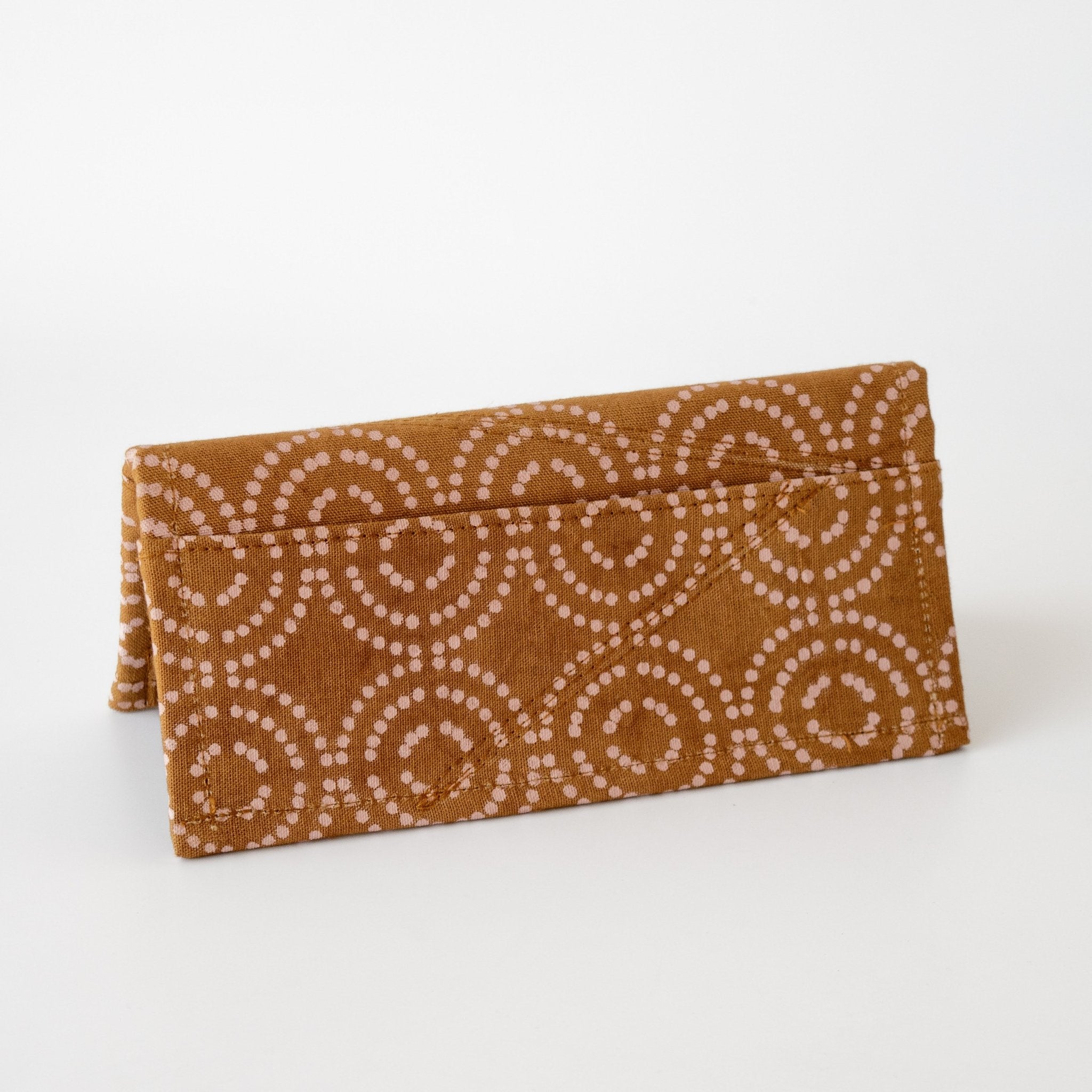 African screen print folding wallet hand made by refugee women in Kenyan fair trade organization