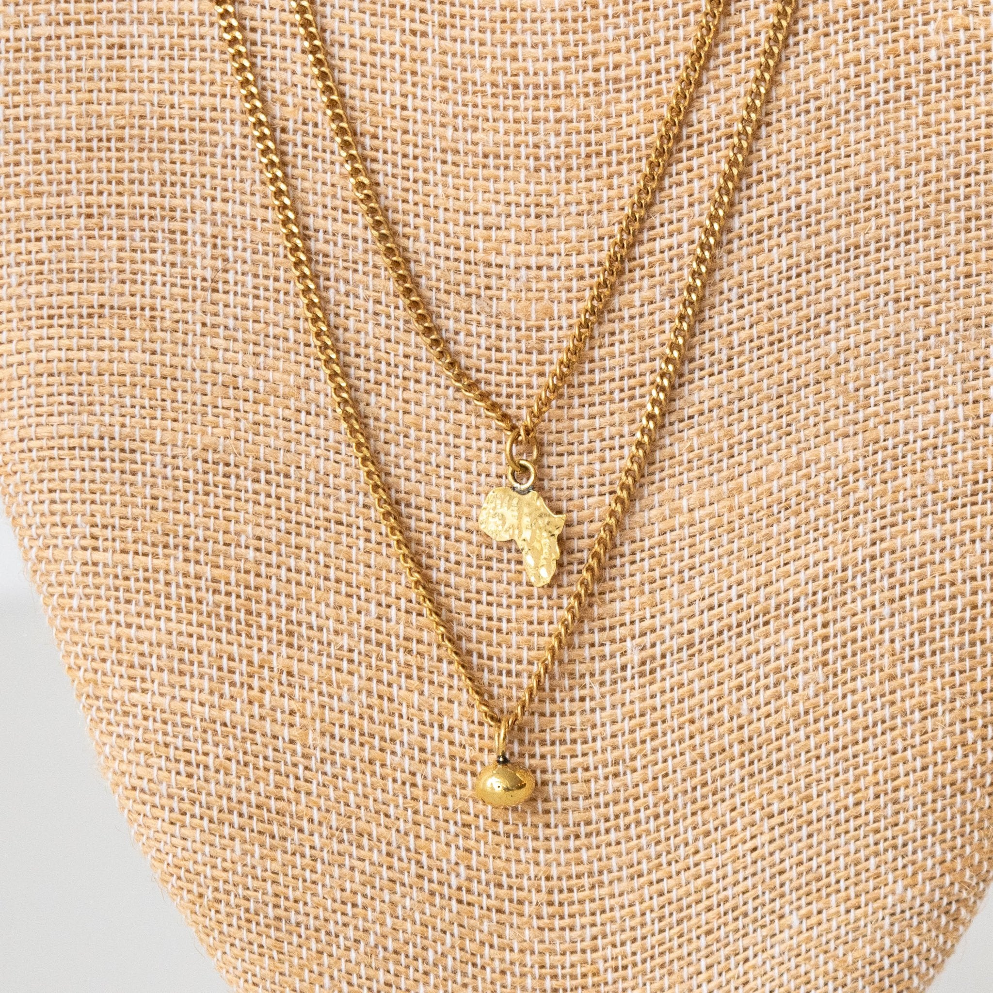 Brass Double Charm Necklace- handmade by Kenyan market artisans for a Fair Trade boutique