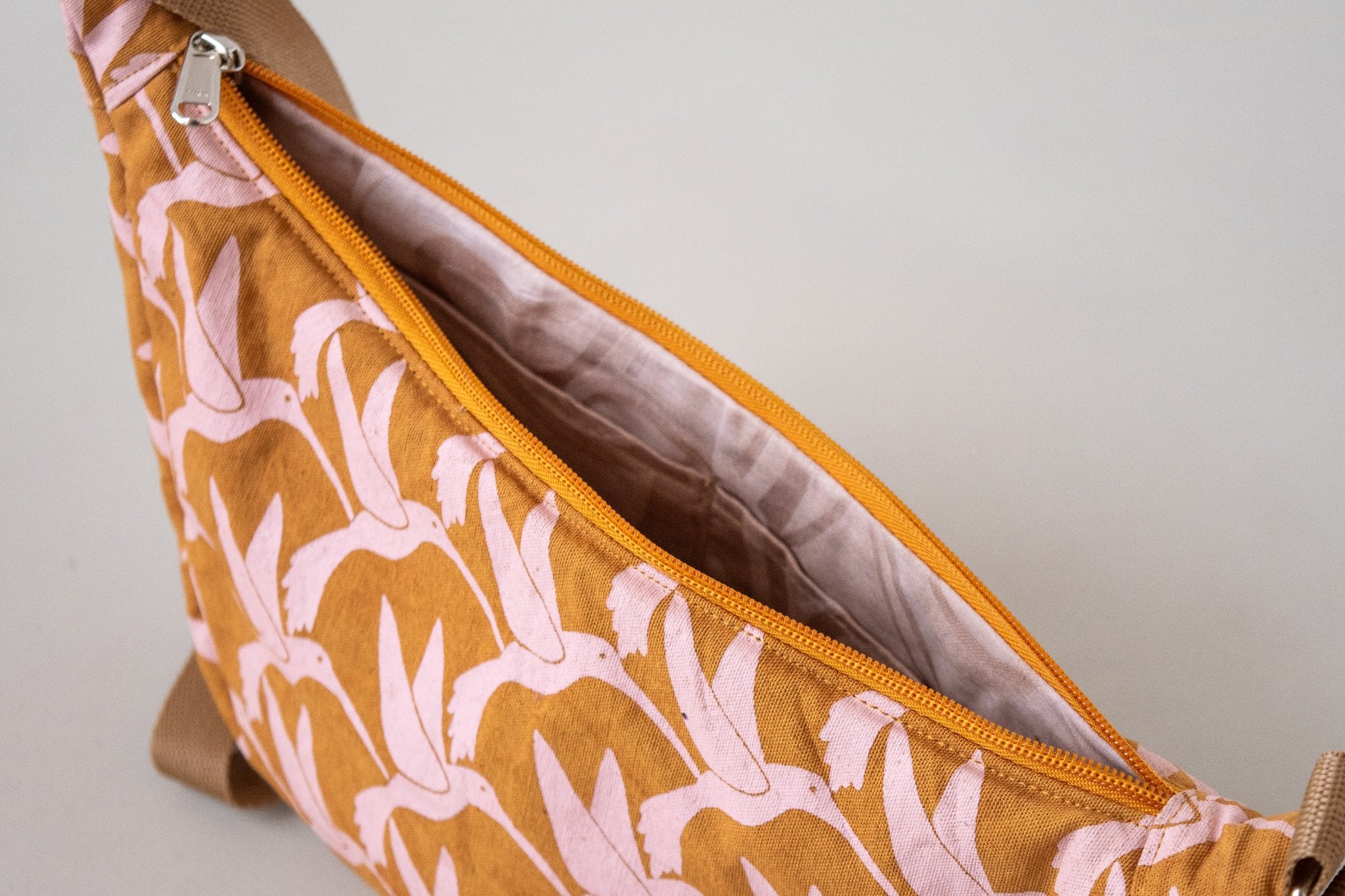 Crescent Sling Bag-handmade by the women of Amani for a fair trade boutique