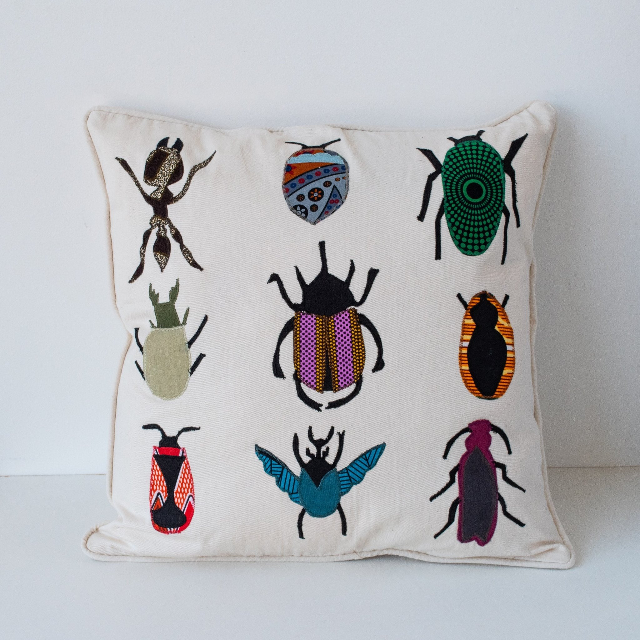  Bug Pillow Case-handmade by the women of Amani using Kenyan materials for a Fair Trade boutique