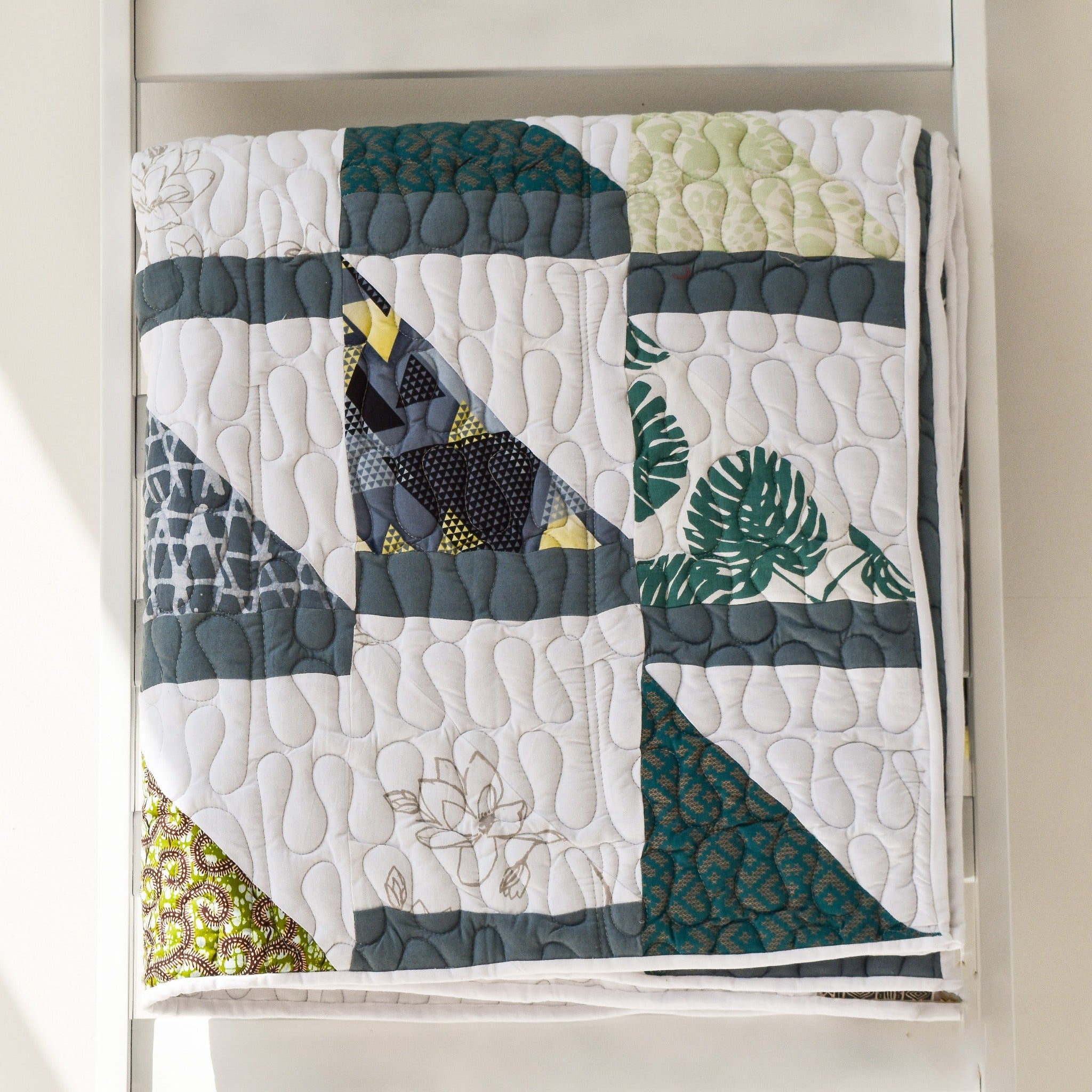 An Amani quilt - handstitched by the women at Amani Kenya for a Fair Trade boutique