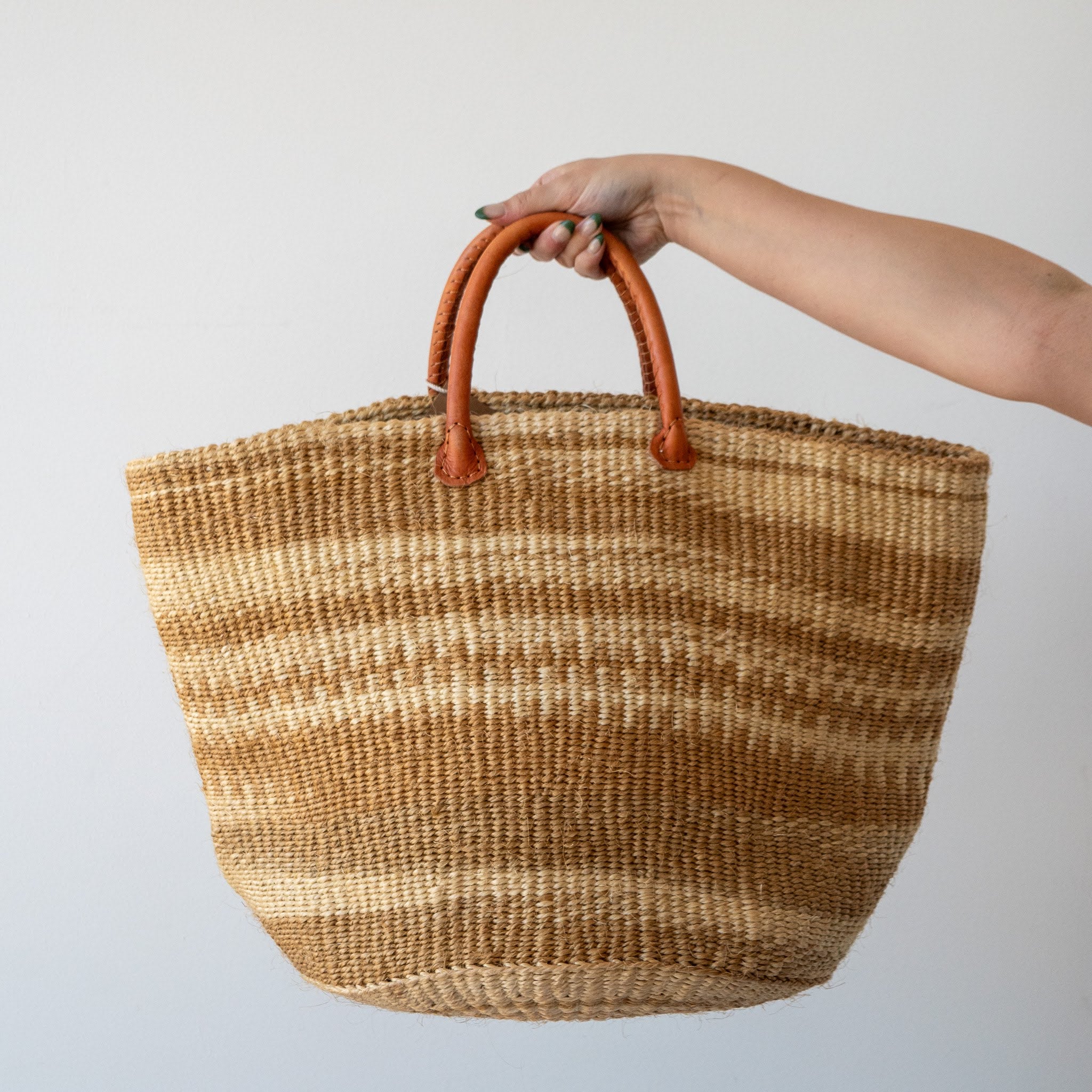 A Fair Trade handwoven sisal basket made by Kenyan artisans