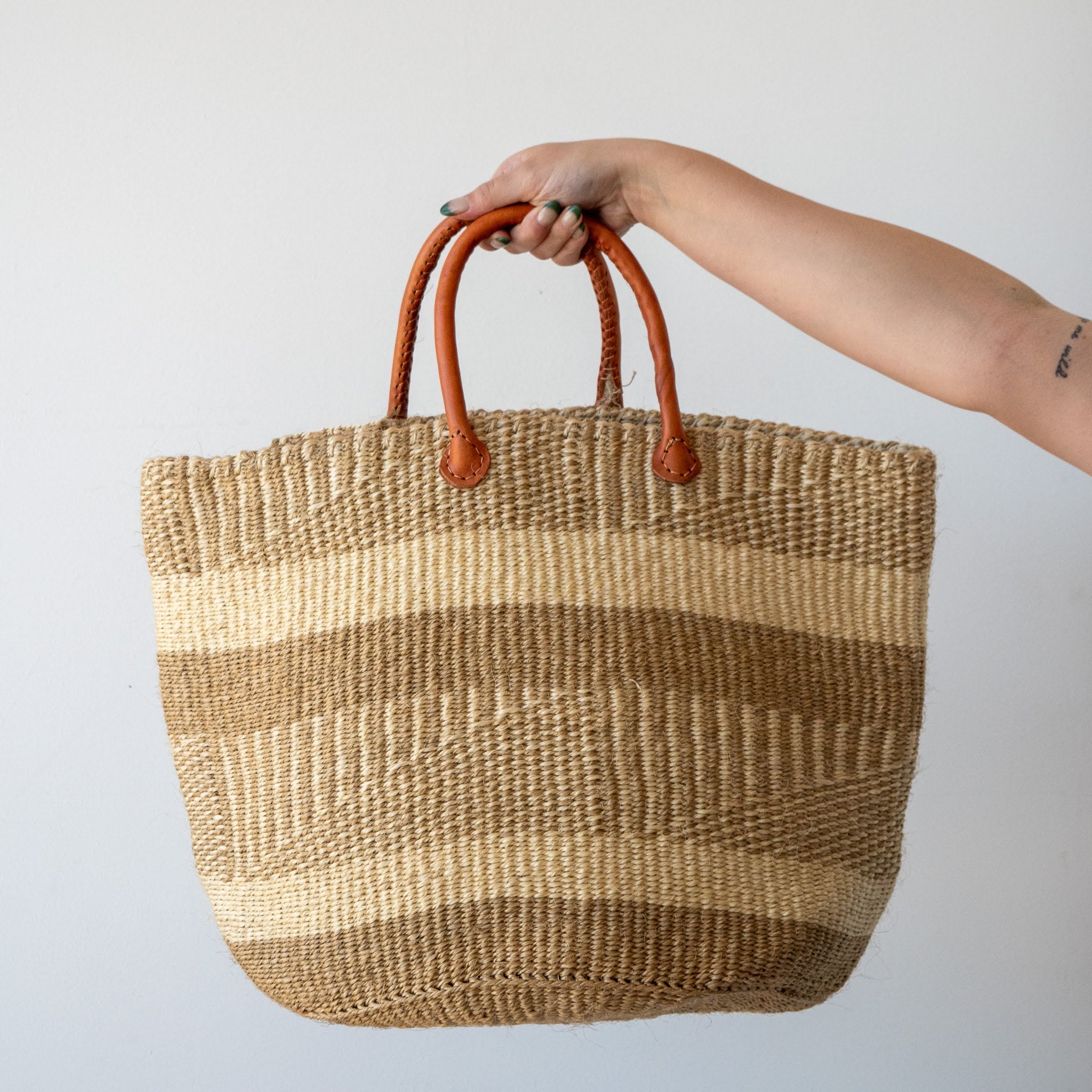 A Fair Trade handwoven sisal basket made by Kenyan artisans