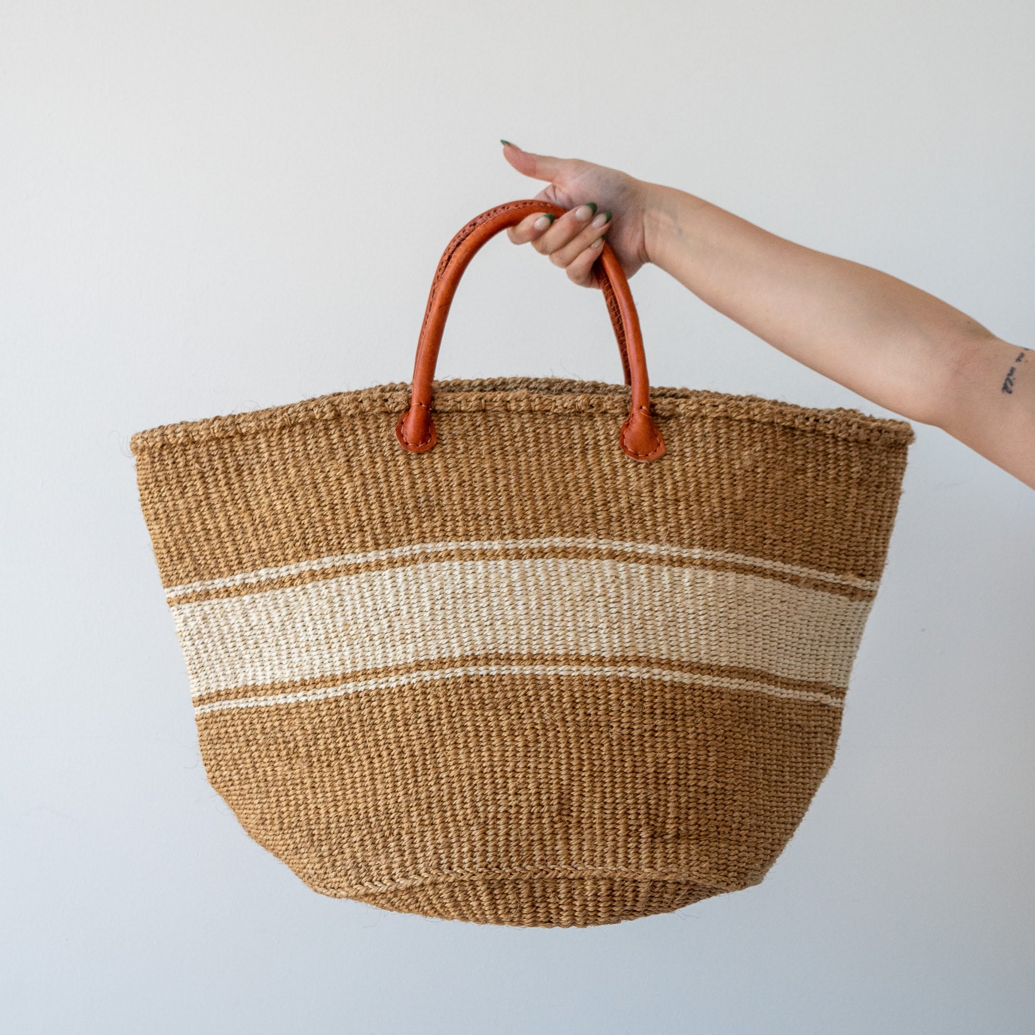 A Fair Trade handwoven sisal basket made by Kenyan artisans