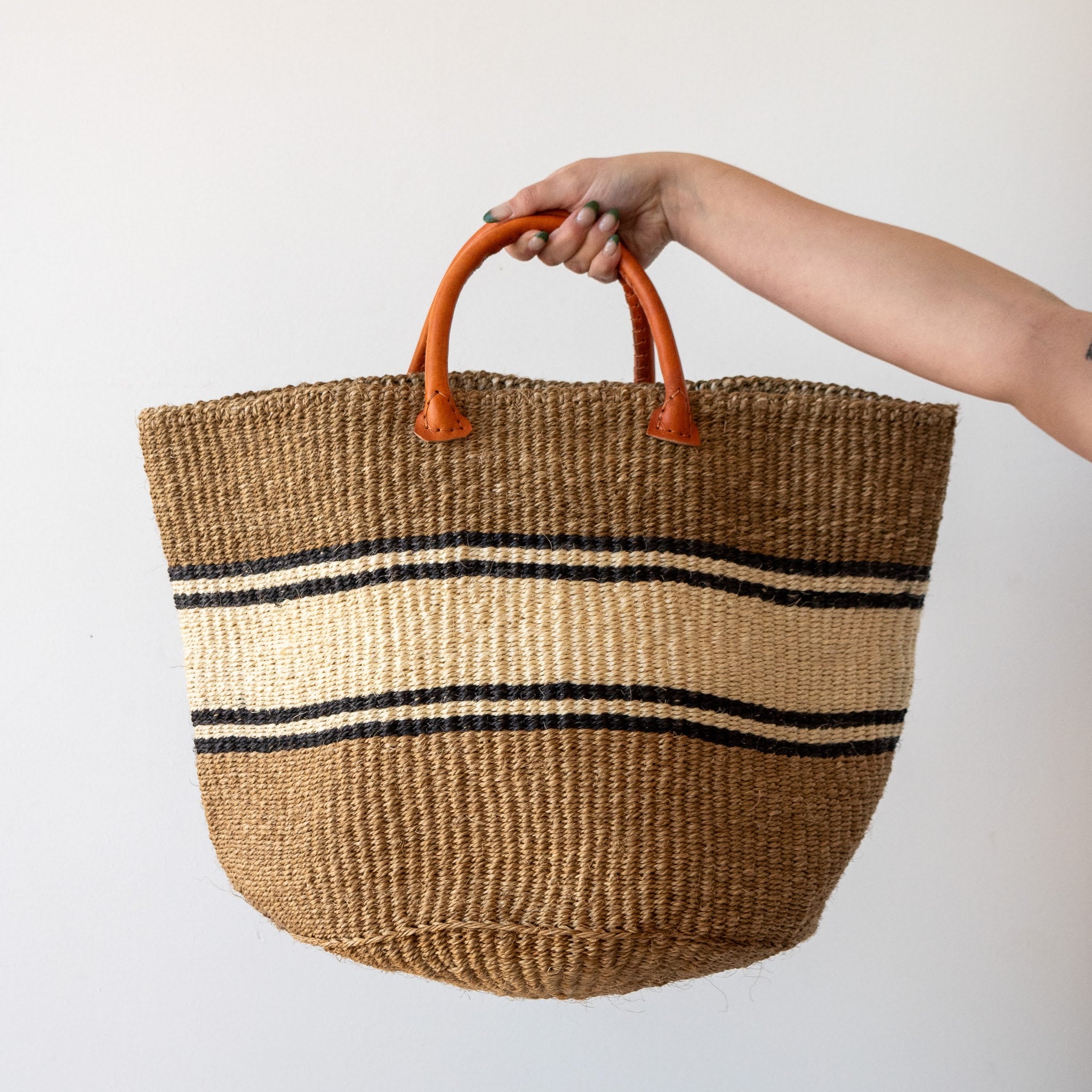 A Fair Trade handwoven sisal basket made by Kenyan artisans