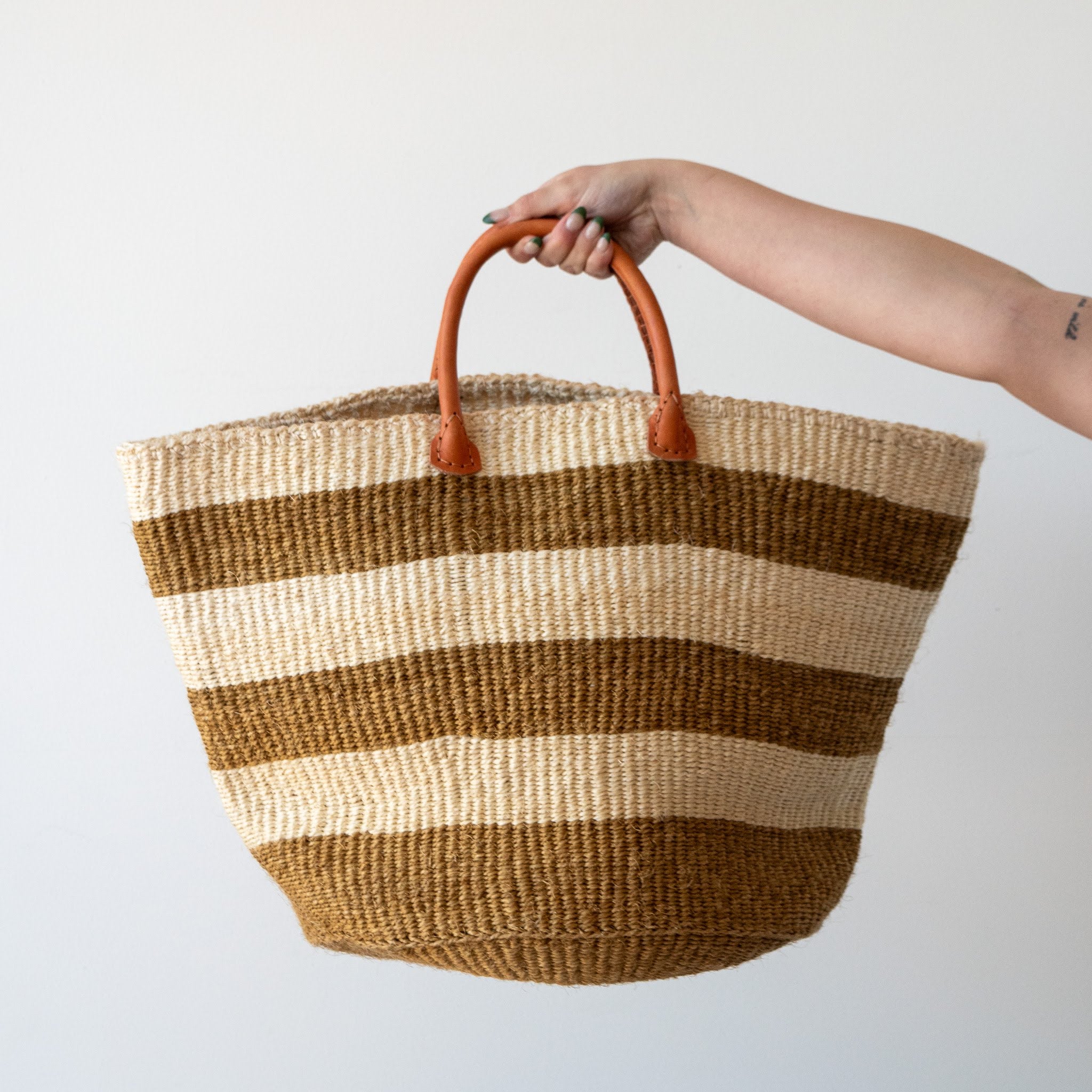 A Fair Trade handwoven sisal basket made by Kenyan artisans