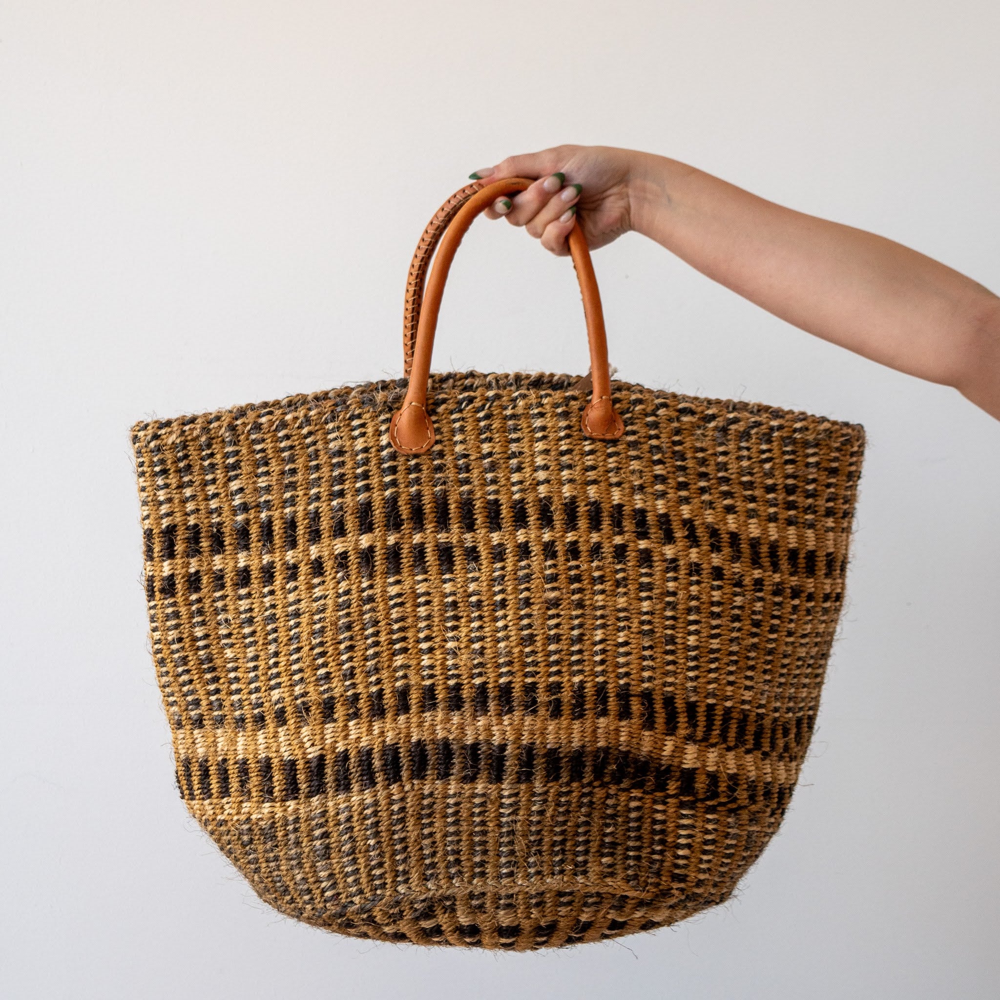 A Fair Trade handwoven sisal basket made by Kenyan artisans