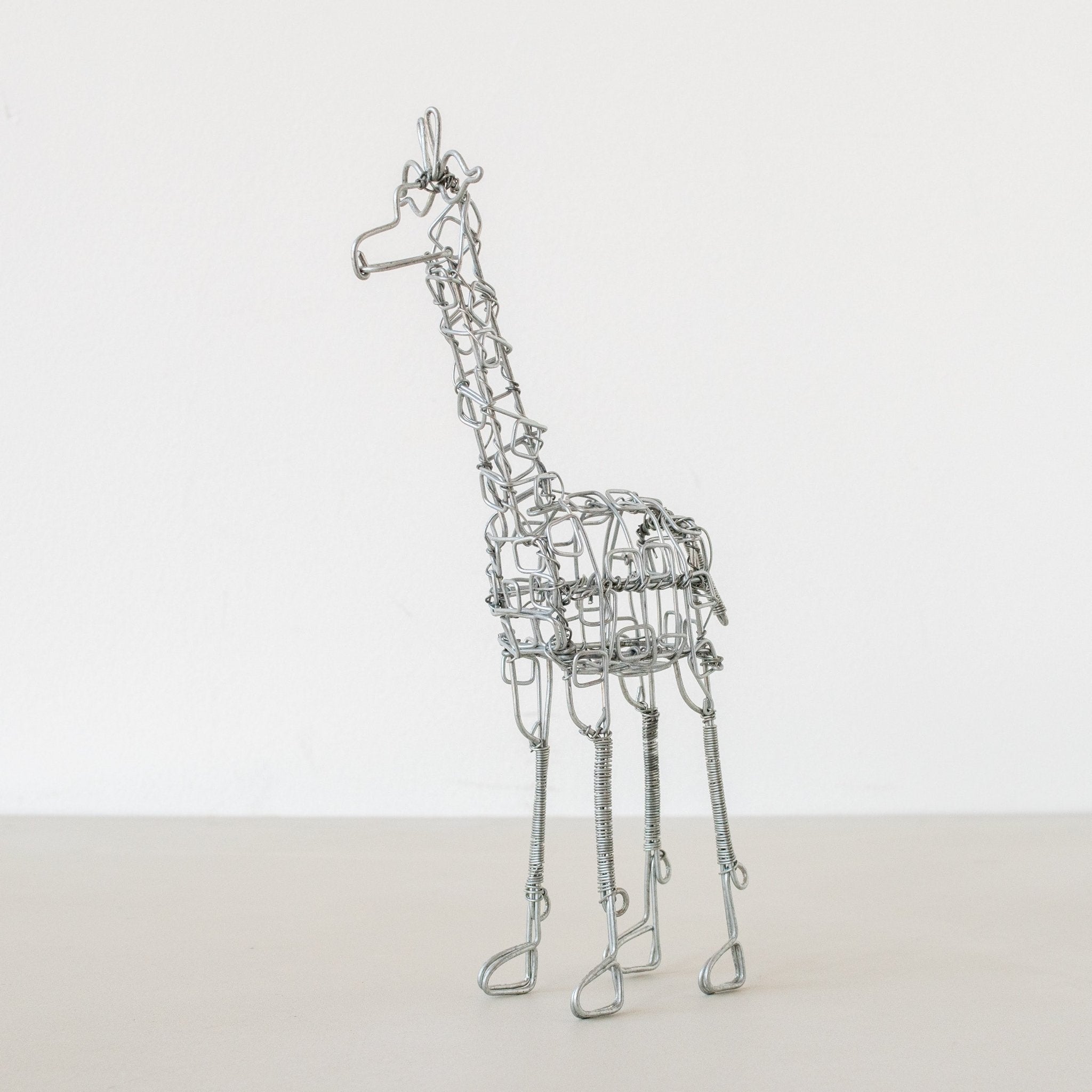 Wire Giraffe-Hand made by Kenyan artisans for a fair trade boutique.