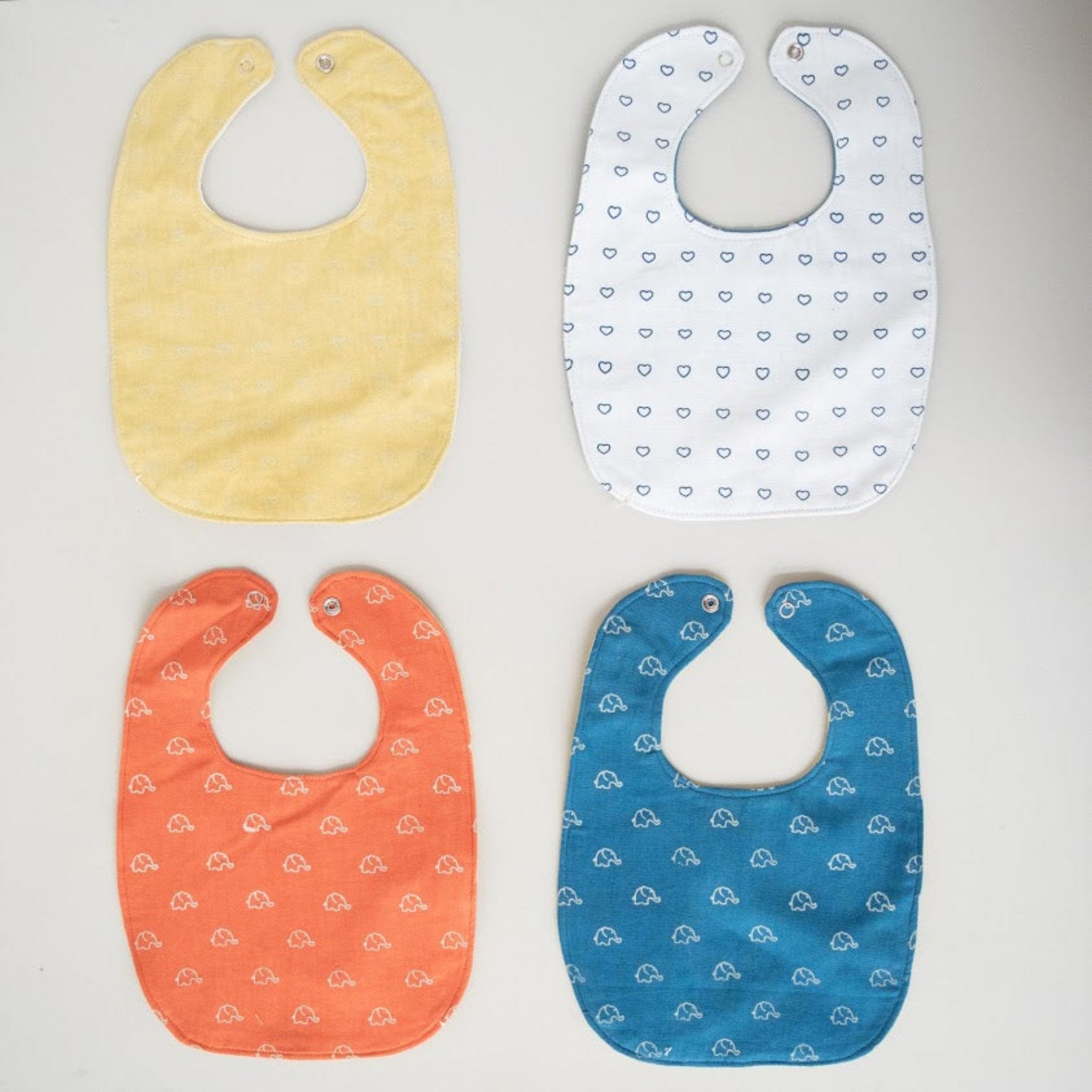 Watoto Baby Bib - Kenyan materials and design for a fair trade boutique