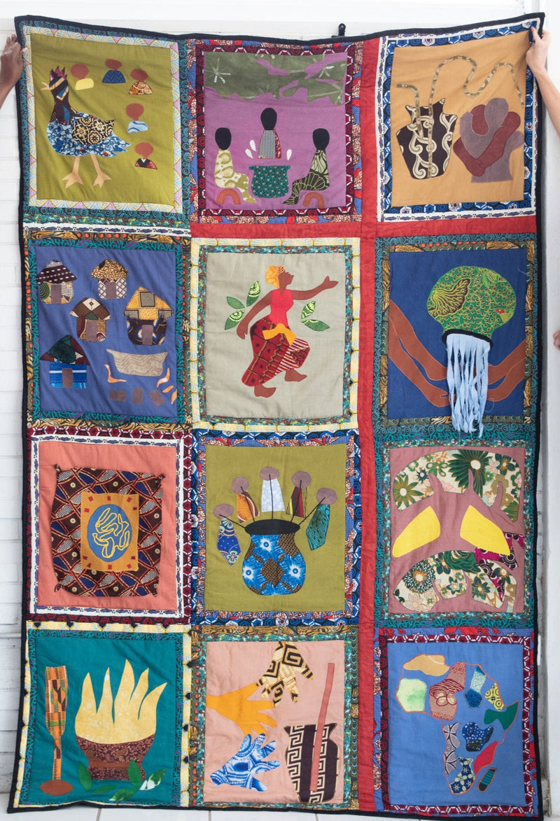Hand stitched, hand dyed fabrics pieced together for the Amani ya Juu Unity Quilt