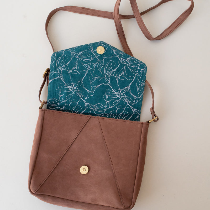 Classic leather satchel - made from all natural Kenyan leather with a jade floral print interior for a Fair Trade boutique