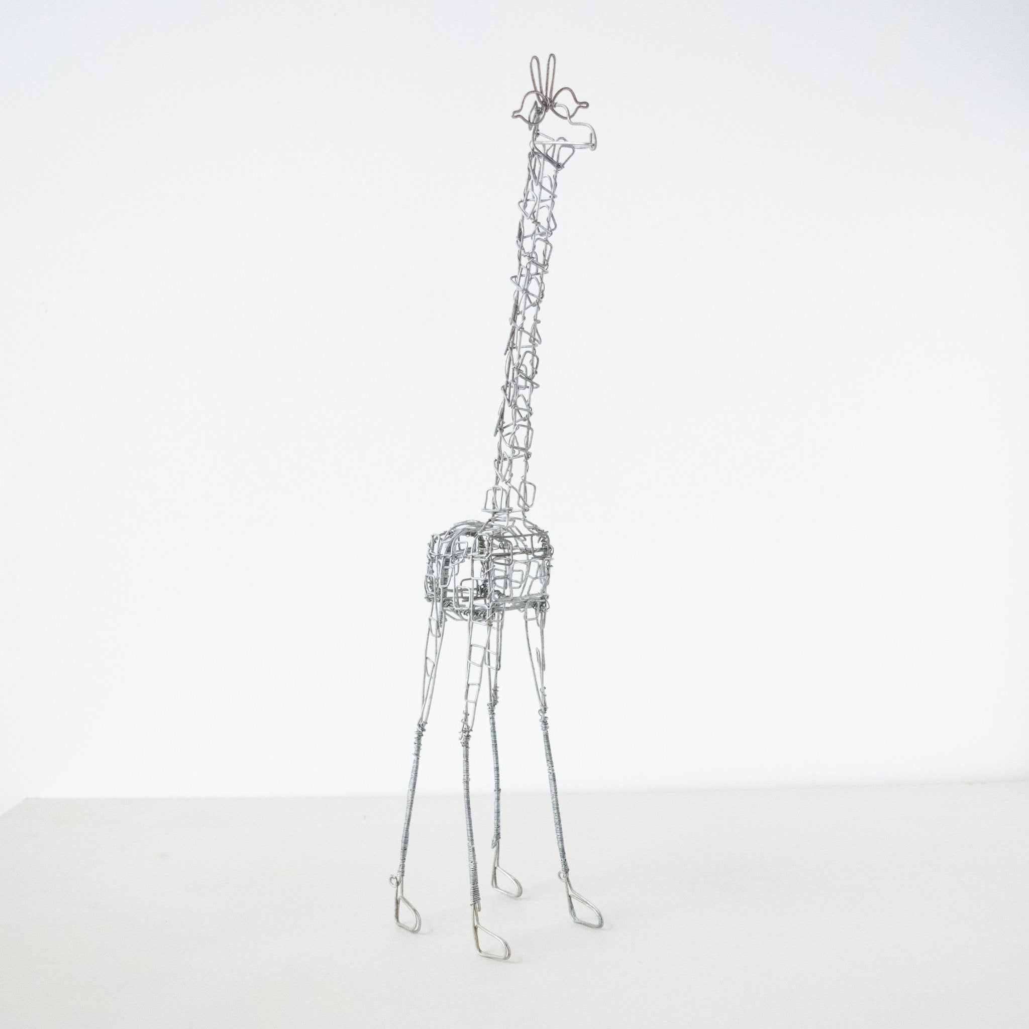 Wire Giraffe-Hand made by Kenyan artisans for a fair trade boutique.