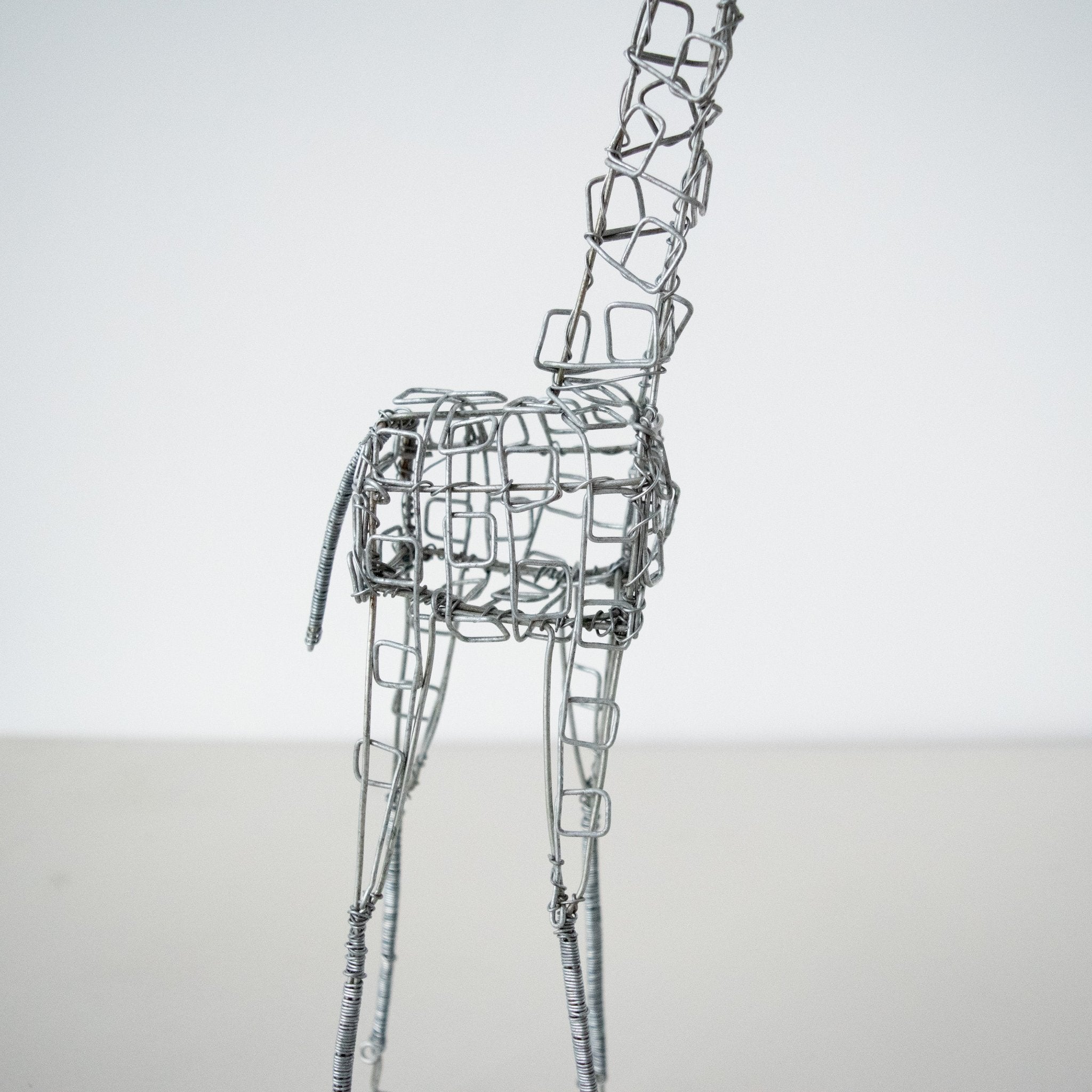 Wire Giraffe-Hand made by Kenyan artisans for a fair trade boutique.