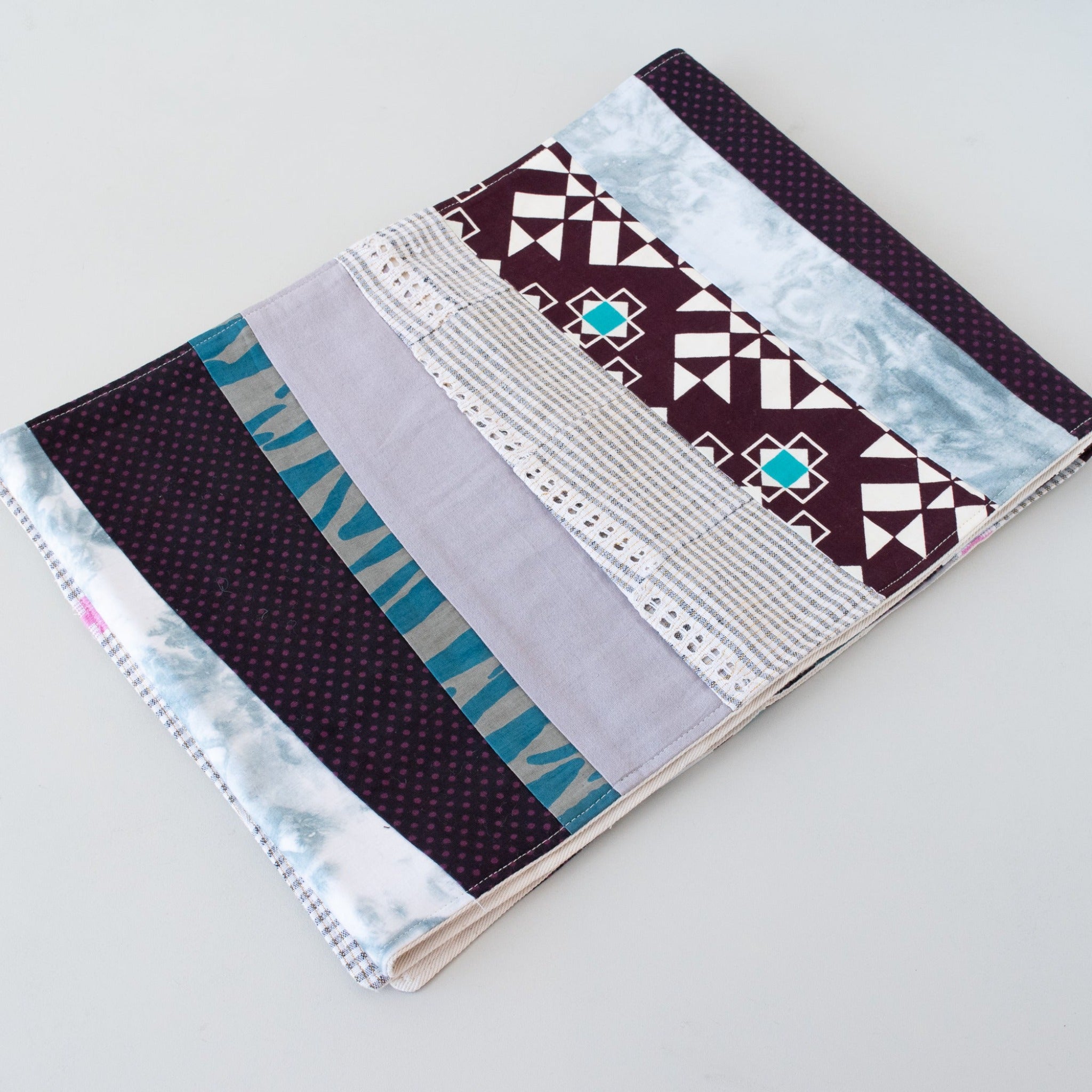 Strip Table Runner handmade by the women of Amani ya Juu, an economic development program for women in East Africa