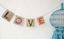 Love Letter Garland - Kenyan materials and design for a fair trade boutique