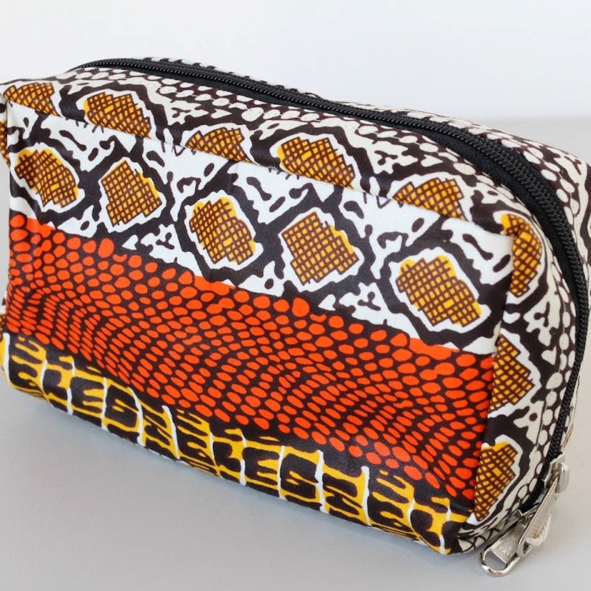 Amani Travel Case - handmade by the women of Amani using Kenyan materials for a Fair Trade social enterprise