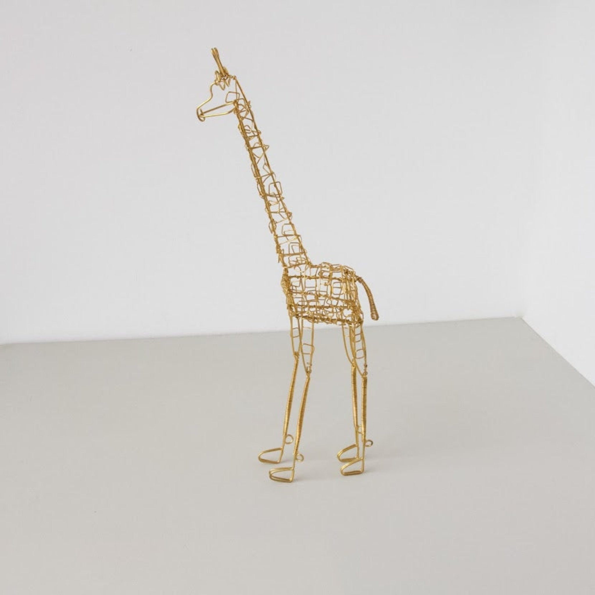 Wire Giraffe-Hand made by Kenyan artisans for a fair trade boutique.