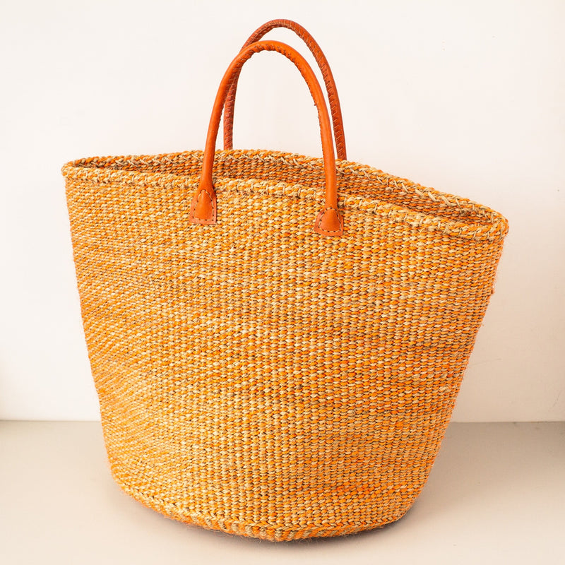 A Fair Trade handwoven sisal basket made by Kenyan artisans