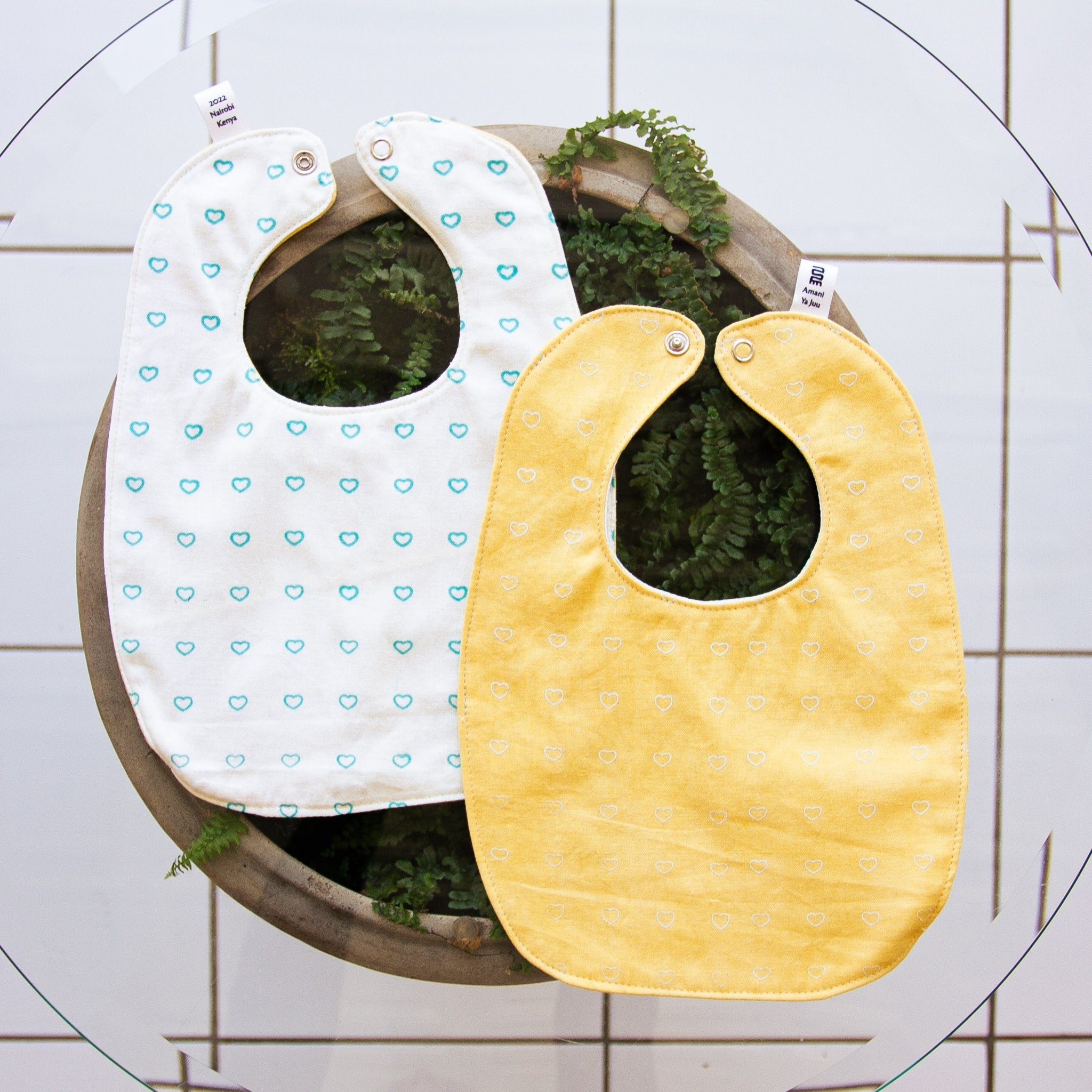 Watoto Baby Bib - Kenyan materials and design for a fair trade boutique