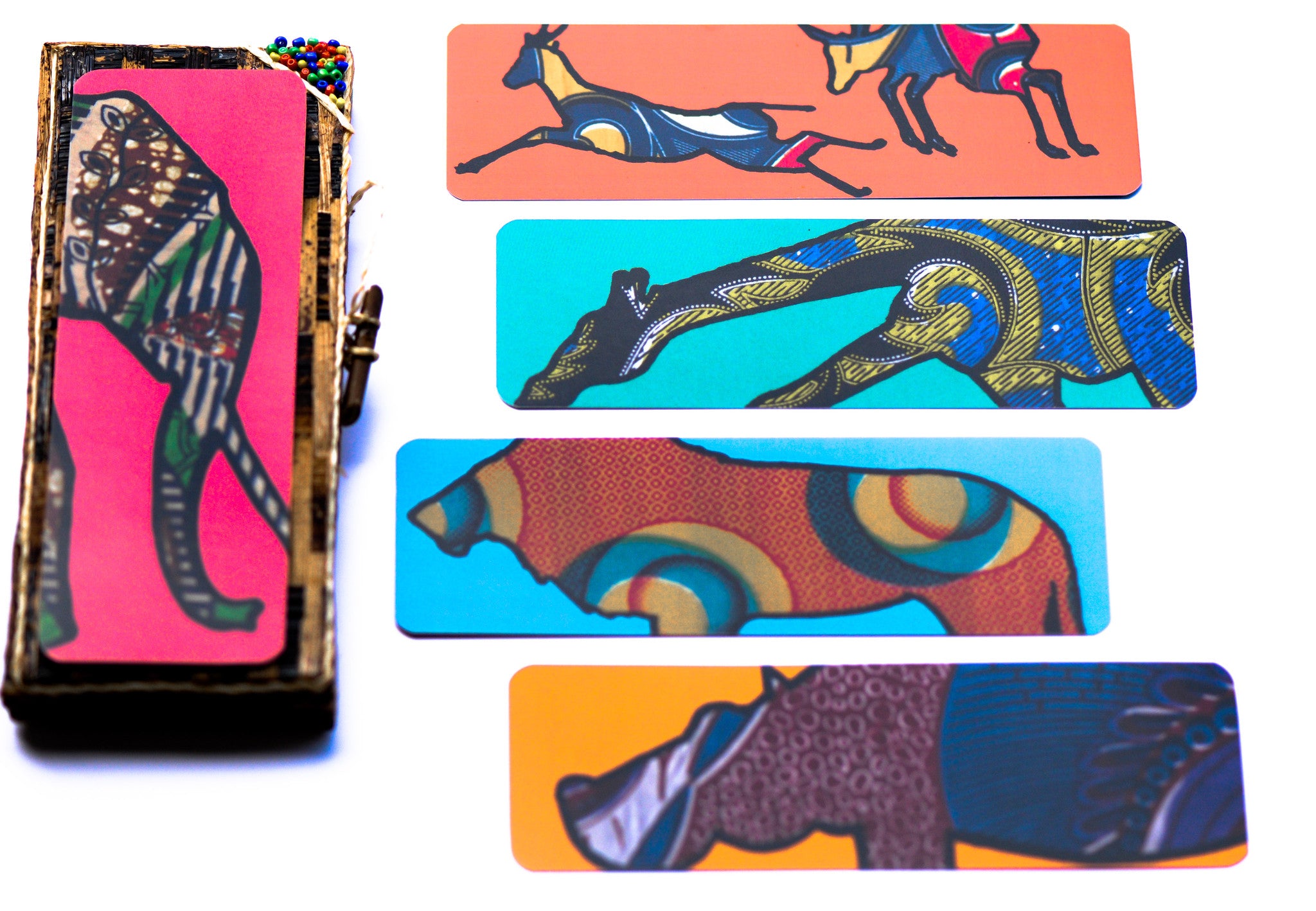 Five colorful safari animal bookmarks on a white background