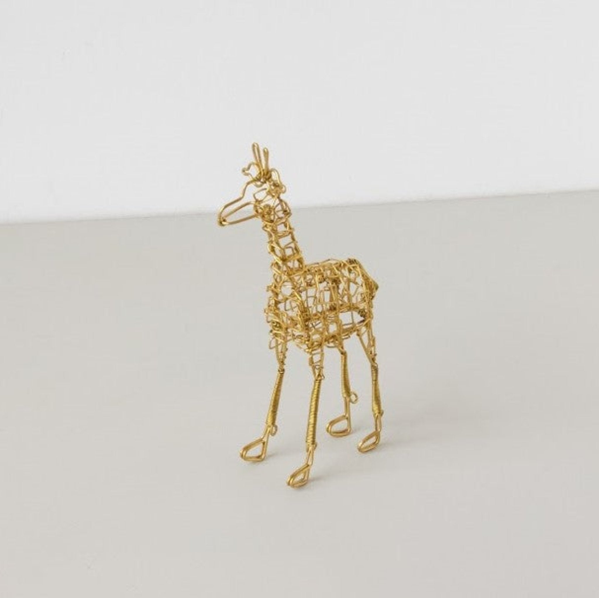 Wire Giraffe-Hand made by Kenyan artisans for a fair trade boutique.