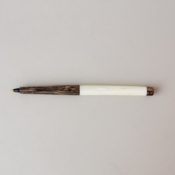 Palm wood and bone pen for an African boutique.