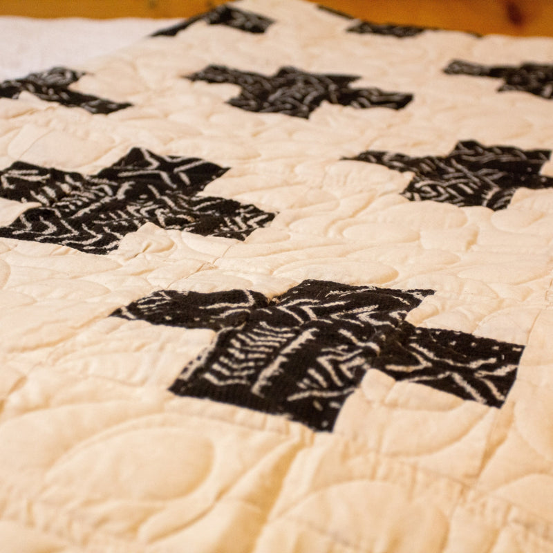 Handmade quilt - natural mud cloth and cotton materials made by the Amani women in Kenya for a Fair Trade boutique