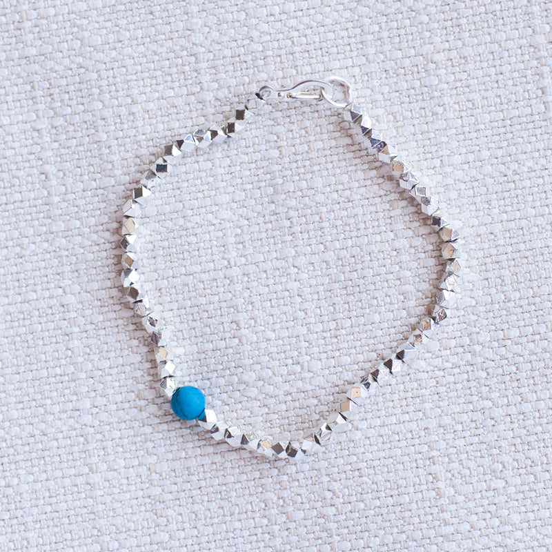 Metallic & Turquoise Bracelet - Kenyan materials and design for a fair trade boutique